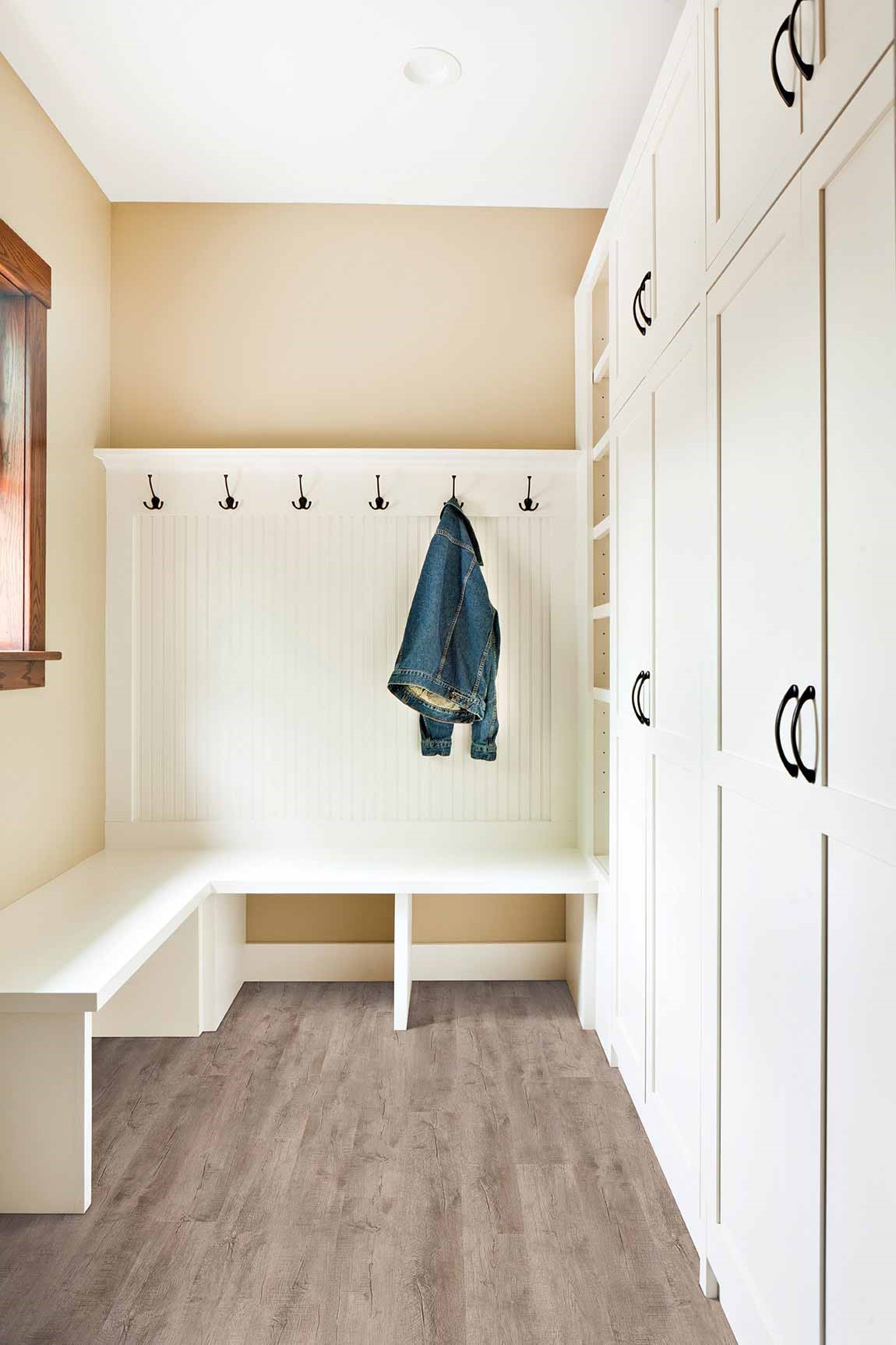 wood look laminate flooring in a mud room