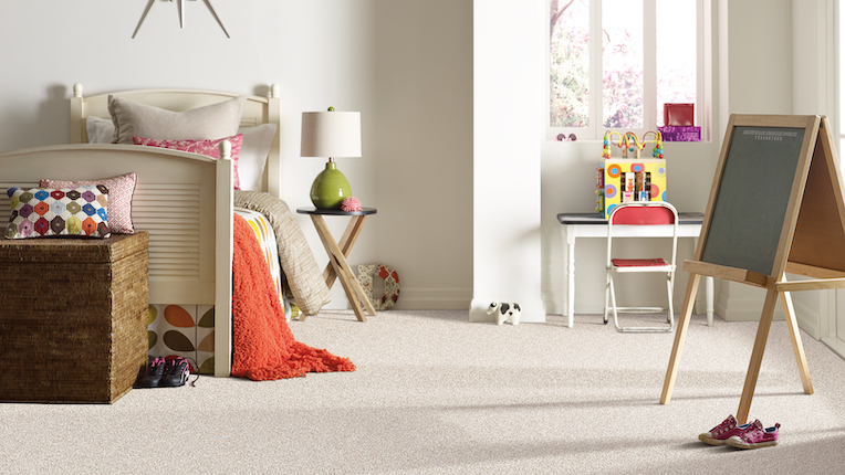 plush off white carpets in a bright children's bedroom